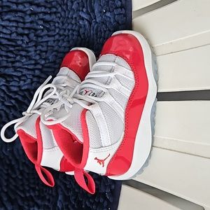 Jordan 11s cherry red